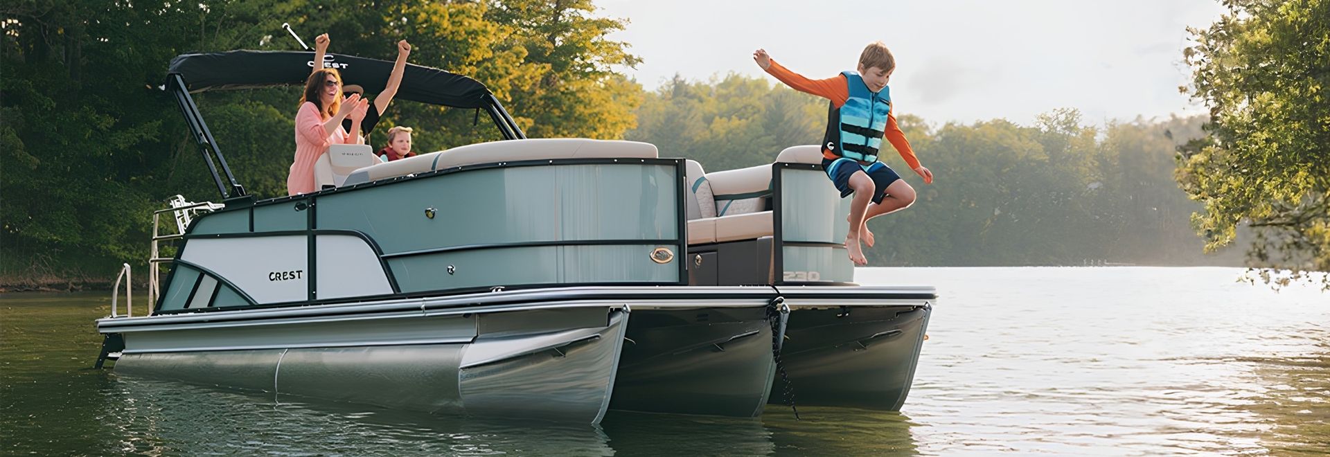 Crest pontoon with family on the water