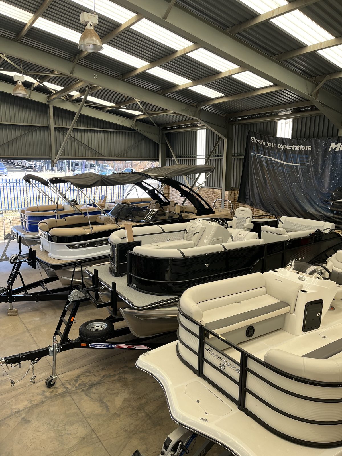 Pontoons and leisure craft on the showroom floor