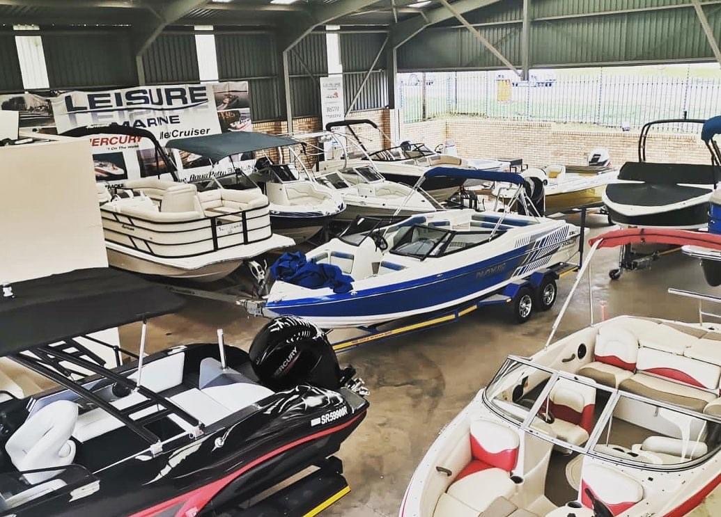 Boats and Suzuki outboards on the Leisure Marine showroom floor